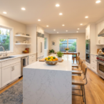 finished modern white kitchen cabinets after professional cabinet painting in Bay Area home — bright clean result by Adval Construction Inc. 2026