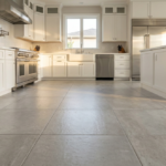 best flooring Bay Area kitchens bathrooms 2026 — modern kitchen with large-format light gray porcelain tile and white Shaker cabinets